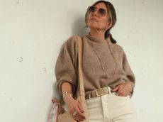 Melissa Meyers wears a brown cashmere sweater.